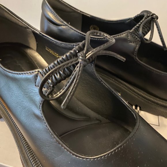 Black faux leather lug sole mary janes with bowtie, new w/box, size 7.5. - Picture 8 of 11